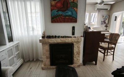 A fully renovated corner bungalow with a large garden.